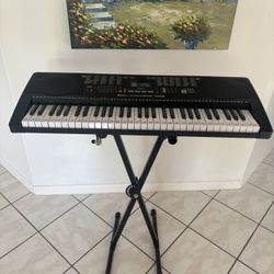 Keyboard With Stand Like New Condition 