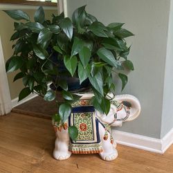 Elephant stand with plant