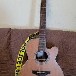 TAKAMINE G-SERIES GN20CE GRAND CONCERT ACOUSTIC ELECTRIC GUITAR SOLID CEDAR TOP MADE IN JAPAN IN NATURAL COLOR. 