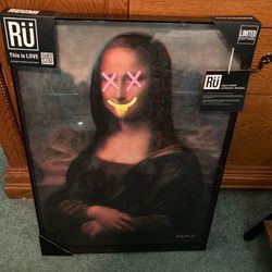 Limited Addition Art Mona Lisa with X eyes and  a yellow melting smile. Very cool piece of art.