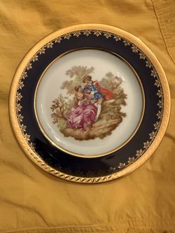 Vintage Limoges porcelain collector plate, featuring a hand-painted Fragonard "courting couple" scene with a cobalt blue and 24-carat gold trim