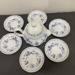 Blue Danube tea pot and six saucers.  Made in Czechoslovakia. Bohemia inglazed.  Tea pot 7” high x 10”, saucers are 5.5” in diameter. 