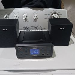 small RCA CD Music  System.  Good Working Condition.  Radio, CD, Bluetooth  Connect USB.