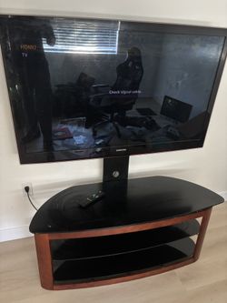 TV w/ Mounted Stand