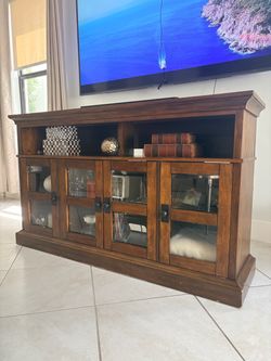 Brown Wood TV Stand with Glass Door Cabinet