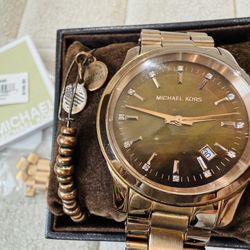 Michael Kors rose gold watch with studs and matching Alex & Ani bracelet - Watch needs battery 