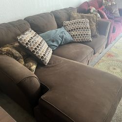 Two Sofas With Pillows