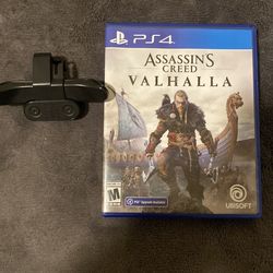 Assassin Creed game and a back button attachment for PS4