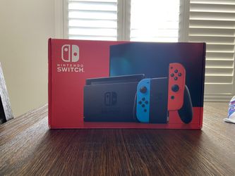 Nintendo Switch With Mario kart 8 Deluxe USED NEAR PERFECT CONDITION