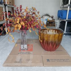 Large flower pot and vase with artificial flowers