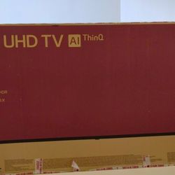 65" 4K UHD Television in box