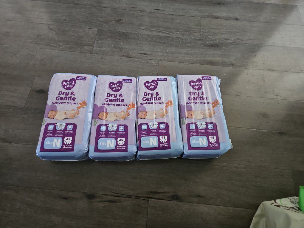 4 Packs Newborn Diapers 45 Count Each