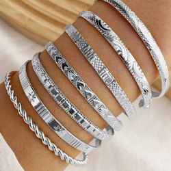 Silver bangles five dollars each also in gold
