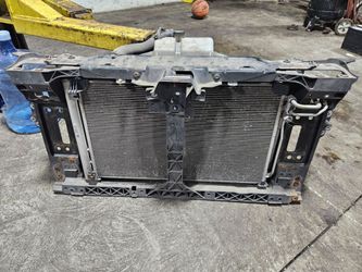 2014-2015 Infiniti Q50 3.7L radiator support with radiator, ac condenser,  fans & hoses