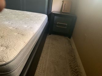 Dark Upholstered Bed Frame with Mattress