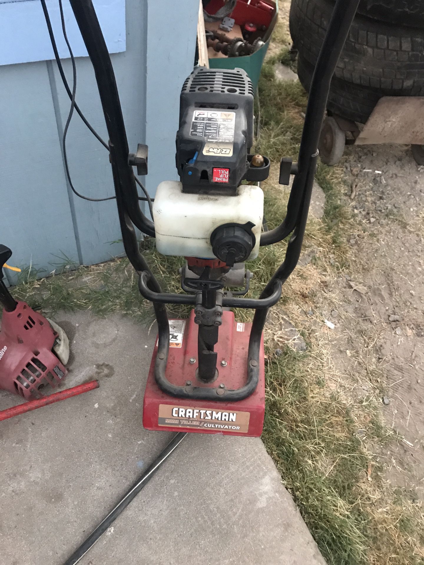 Roto till craftsman gas powered runs excellent and chops dirt super fast