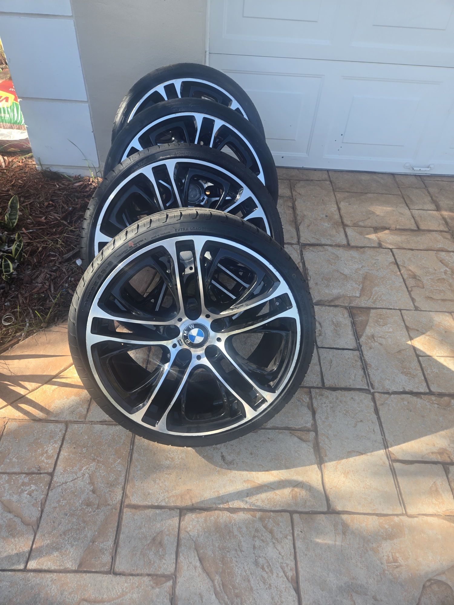 A set of 4 BMW wheels & tires