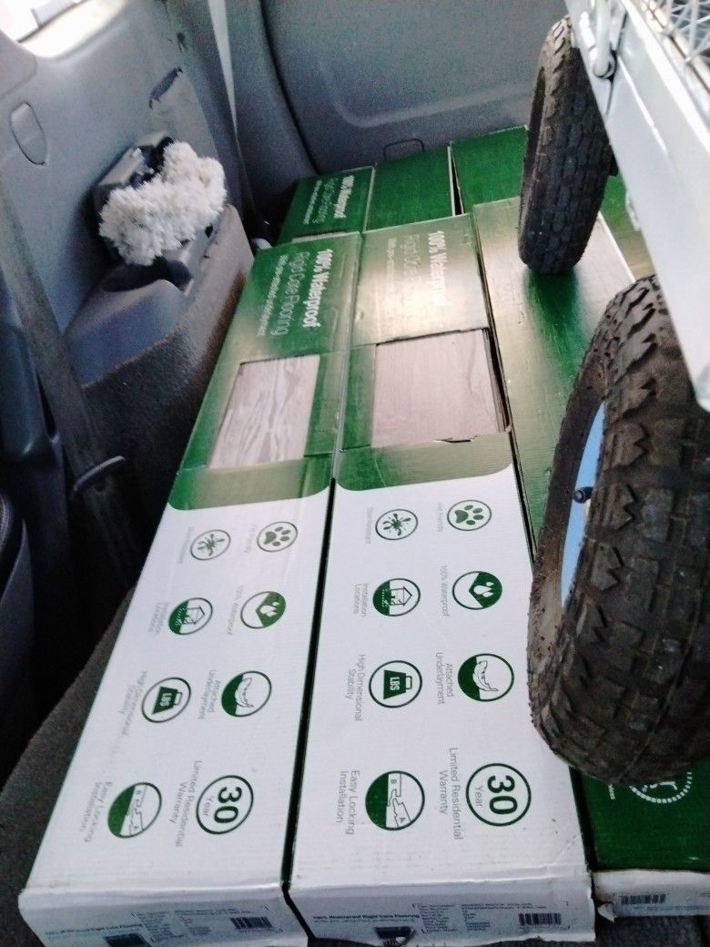 100% Waterproof Rigid Core Flooring With Pre attached Underlayment I Will Take $400 For All 11 Boxes!