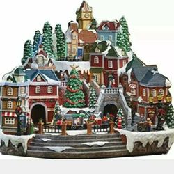 Christmas Village Animated with Lights Music and a Rotating Tree and Train