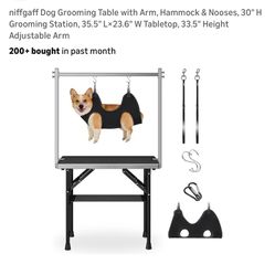 Dog grooming table