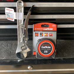 Measuring tape and adjustable wrench