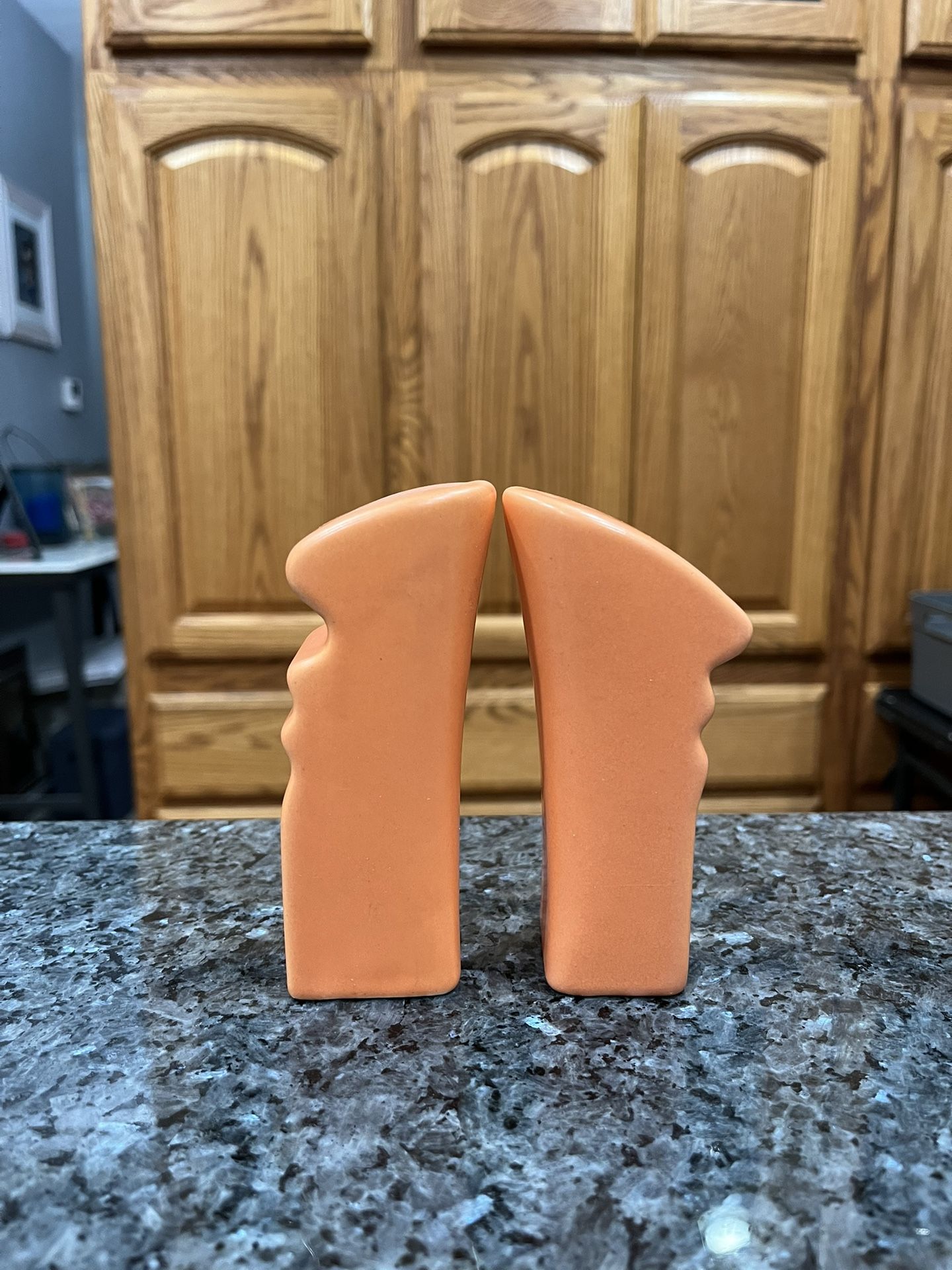 Modern Art pair of Salt And Pepper Shakers. Size approximately 4 inches tall. Preowned never used display only.