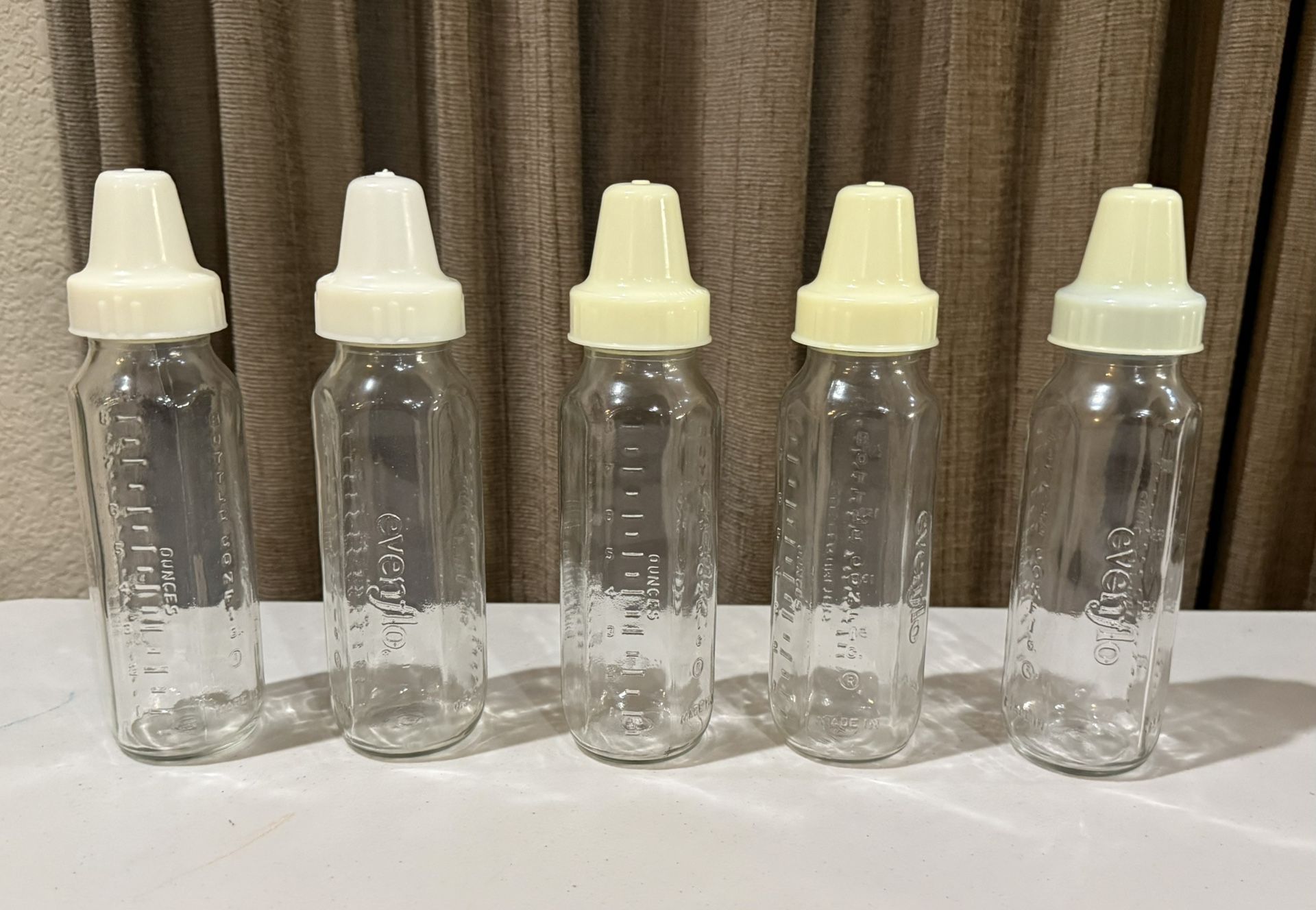 Five Vintage 8 oz Glass Evenflo Baby Bottles with Caps Made in USA $20 Each