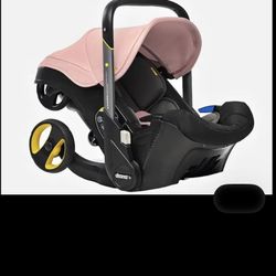 Pink Doona Stroller