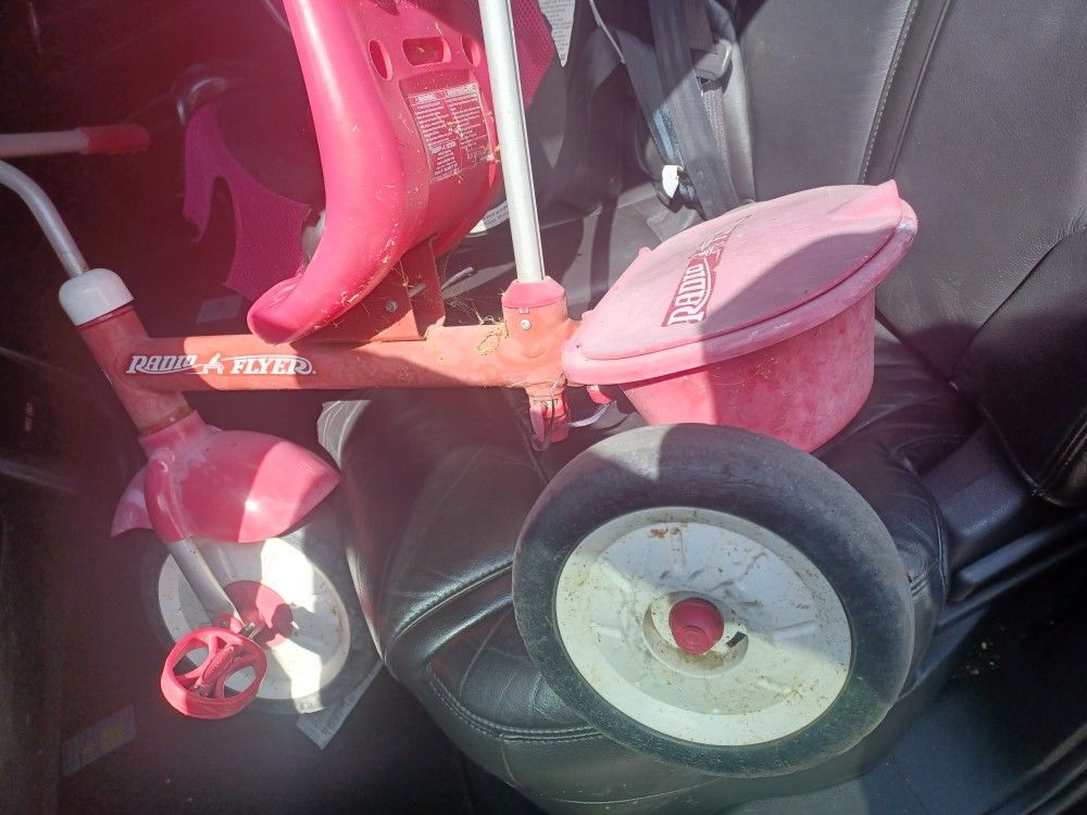 Tricycle/ Push Like A Stroller.