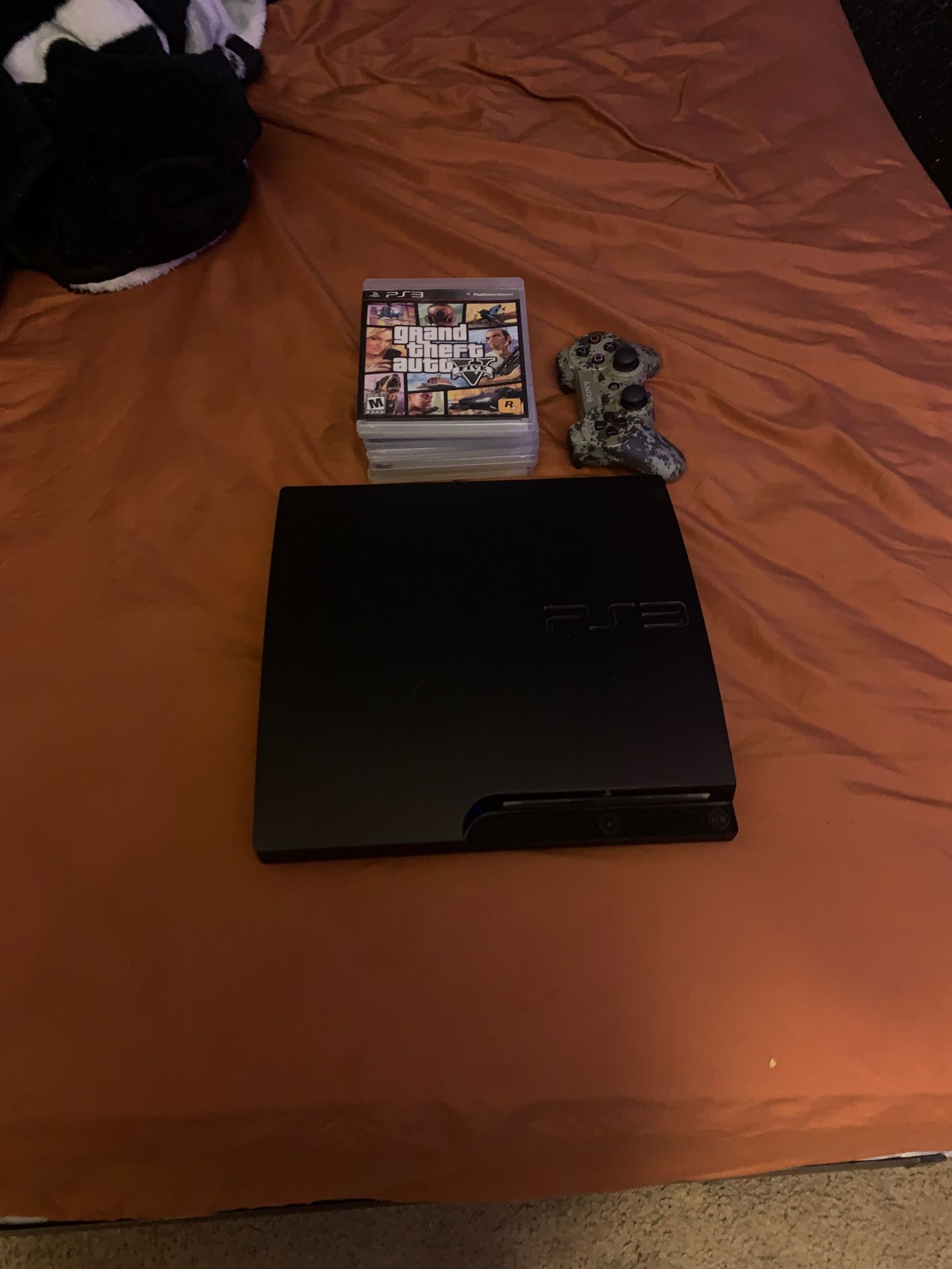 PS3 with control and games