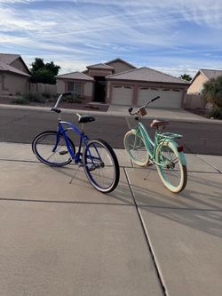 Two Beach Cruiser Bicycles Blue and Mint