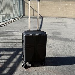 Carry on luggage black color 20” Karl home Brand new