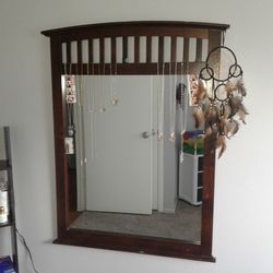 Dark brown wood mirror