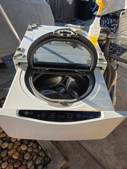 show an LG SideKick Pedestal Washer, a 1.0- cubic-foot mini washing machine
