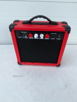 LYX Pro AGL-20 Portable Guitar Amplifier 20W Red. Used in good condition with some scratches and scuff marks