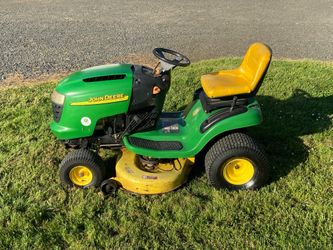 John Deer L118 riding lawn mower