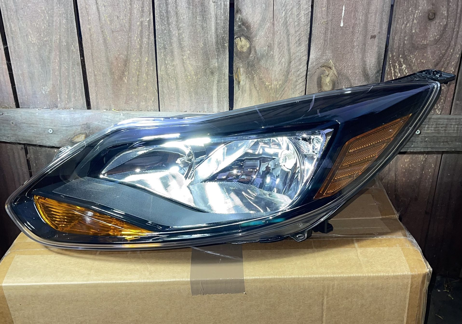 2012 to 2014 Ford Focus Driver Side Black Housing Headlight