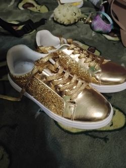Gold sparkly sneakers