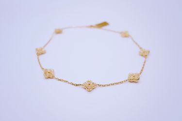 10 K yellow gold flower chain