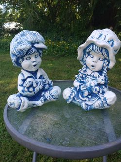 Vintage 1970's   - 2  Sculptures 10" tall Girl Holding Cat & Boy Holding Dog,