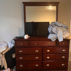 Dresser with attached mirror