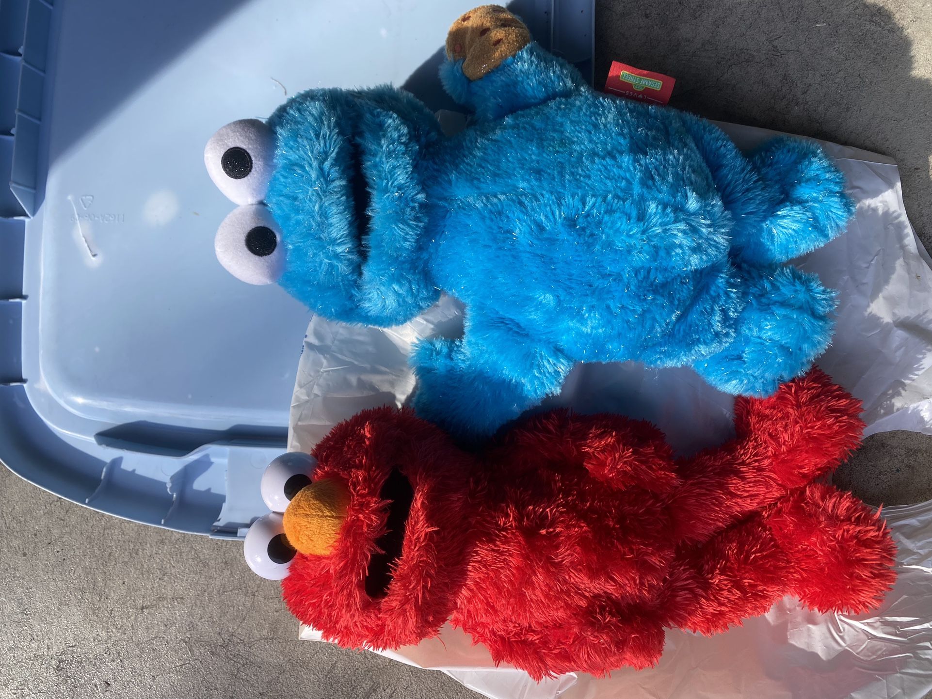 Tickle Me Elmo Talking Toy and Cookie Monster Plush Toys