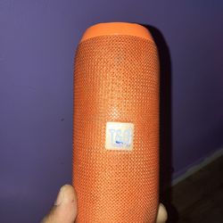 Three Bluetooth speakers one with the LED light and one is a regular speaker like a bullet