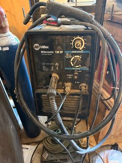Welder with cart and argon bottle