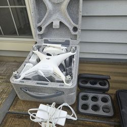 DJI Phantom 4, 3 Batteries, Polar Pro Lenses, Case