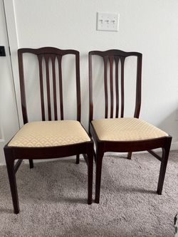 Two Mahogany Chairs with Cushions