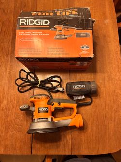 RIDGID 4 Amp Corded 6 in. Variable-Speed Dual Random Orbital Sander with dust bag.