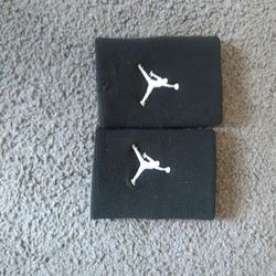 Two Jordan arm bands