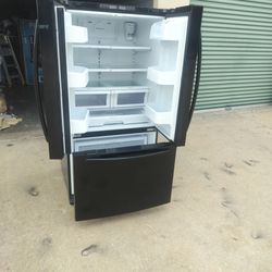 Black Samsung refrigerator