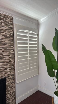 White Plantation Window Shutters with Arch Top